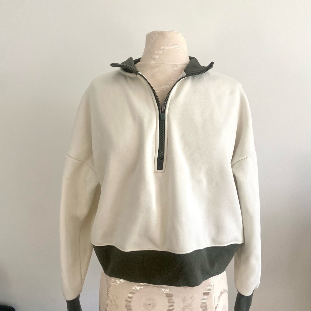 Fabletics ivory & dark khaki green quarter zip crop sweatshirt
